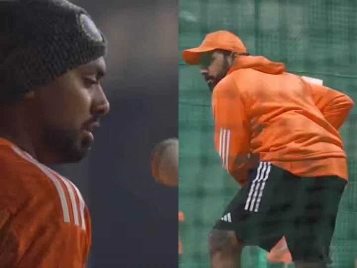 Cricketer practicing bowling in nets.