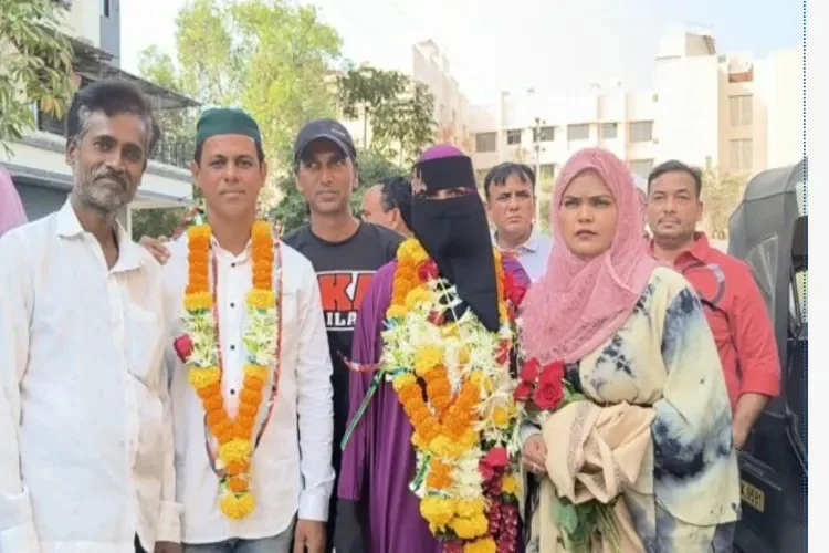 Group of people posing during a cultural event.