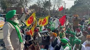 Farmers' protest with flags and banners.