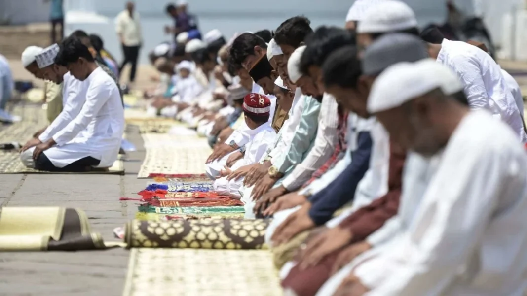 Prayer gathering by waterfront.